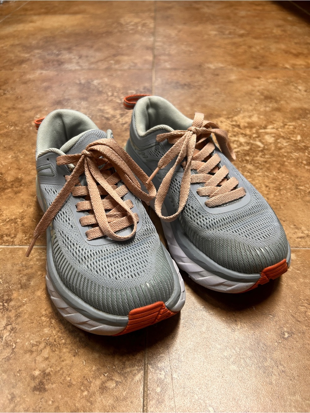 Hoka OneOne Women's Running Shoes in Light Blue and Peach/pink accent color